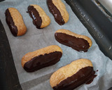 Foto del paso 12 de la receta: Bizcochos de soletilla rellenos de ganache de caramelo salado (sin gluten)