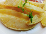 Fried potato wedges