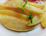 A picture of step 4 of Fried potato wedges.