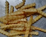 A picture of step 5 of Peri peri fries.