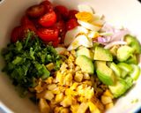 A picture of step 2 of Avocado Tomato Corn Salad.
