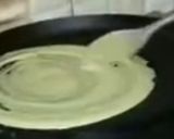 A picture of step 5 of Besan chilla.