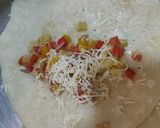 A picture of step 7 of Stuffed crepes with Mexican green sauce.