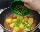 A picture of step 4 of Aloo Matar.