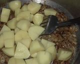 A picture of step 2 of Aloo biryani.