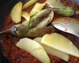 A picture of step 6 of Baigan aloo in pickle gravy.