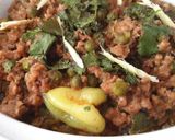 A picture of step 9 of Qeema matar (minced meat with peas).