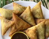 A picture of step 7 of Samosa and a chutney.