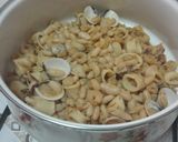 Foto del paso 11 de la receta Alubias con calamares y almejas