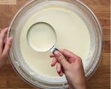 A picture of step 3 of Rainbow Crepe Cake.