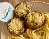 Une image de l'étape 6 de Champignons au four farcis au Boursin®️.