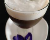 A picture of step 4 of Butterfly pea flower coffee latte.