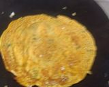 A picture of step 3 of Besan chilla.