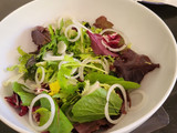 Salad with crispy Iberian ham and pomegranate
