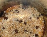 Foto del paso 5 de la receta: Arroz con calamares en salsa americana en olla GM