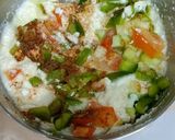 A picture of step 3 of Leftover Poha chilla With Fresh Veggies.