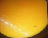 A picture of step 2 of Cusrated powder karachi halwa.