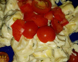 A picture of step 4 of Tortellini with homemade alfredo garlic sauce.