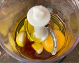 A picture of step 1 of Caesar Salad Dressing.