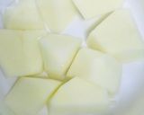 A picture of step 1 of Aloo gosht curry.