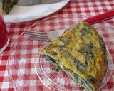 Foto del paso 6 de la receta: Tortilla de patatas con espinacas y piñones