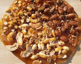 A picture of step 10 of Mixed nuts chikki pizza (chizza).