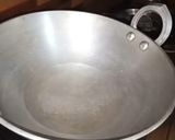 A picture of step 1 of Kakara Pitha.
