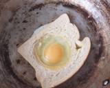 Egg in a hole sandwich recipe step 1 photo