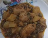 A picture of step 8 of ALU Matar Chicken.