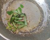 A picture of step 12 of Prawn curry.