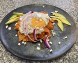 Foto del paso 5 de la receta: Chilaquiles rojos con huevo estrellado