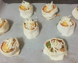 Foto del paso 4 de la receta: Rollitos de hojaldre al estilo pizza con huevo de codorniz
