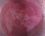 A picture of step 1 of Black currant and strawberry sauce.