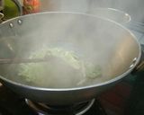 A picture of step 2 of Tricolor Cabbage Fry.