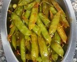 A picture of step 3 of Fried masala green peas.