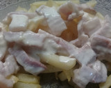 Foto del paso 4 de la receta: Papas fritas con salsa y crutones