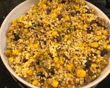 A picture of step 3 of Curry millet grain with black beans and sweet corn.