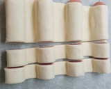 Foto del paso 5 de la receta: Canapes de hojaldre de salchichas 