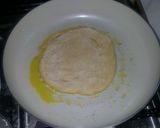 A picture of step 4 of Naan bread and chicken curry.