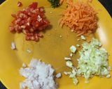 A picture of step 3 of Dhokla disk with salsa topping.