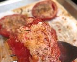 A picture of step 3 of Broiled fresh garlic parm tomatoes.