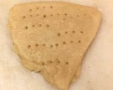 A picture of step 3 of Badam puri.