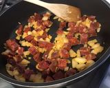 Une image de l'étape 6 de Sauce tomate relevée au chorizo ibérique et olives vertes.