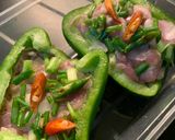 A picture of step 3 of Baked Bell Peppers Stuffed with Ground Pork and Runny Egg.