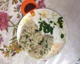 A picture of step 1 of Upma with moringa leaves.