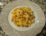A picture of step 5 of Zucchini with Ham, Cheese, and Eggs.
