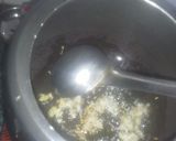 A picture of step 1 of Yellow daal tadka.