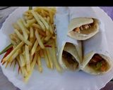 A picture of step 14 of Arabic shawarma wrap.