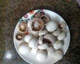 A picture of step 1 of Stuffed mushrooms.