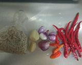 Foto langkah ke 3 dari resep Tumis bunga pepaya.